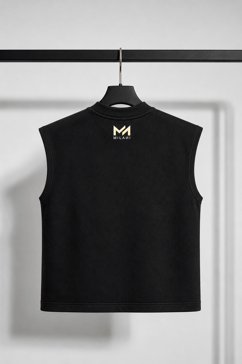 MILANI Born for Stardom Heavyweight Sleeveless Tee – Black - MILANI CLOTHINGMILANI Born for Stardom Heavyweight Sleeveless Tee – BlackMILANI CLOTHINGMILANI CLOTHING6-7 yearsBlack sleeveless shirt with a logo on a hanger against a white background