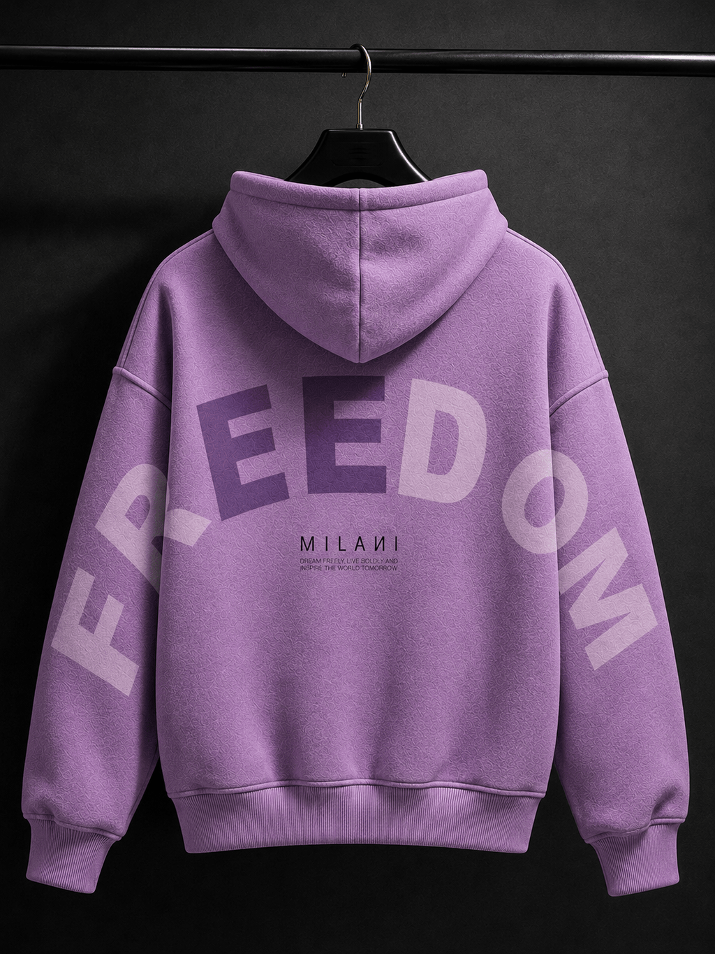 MILANI Freedom Kids Heavyweight Hoodie – Lavender - MILANI CLOTHINGMILANI Freedom Kids Heavyweight Hoodie – LavenderMILANI CLOTHING PTY LIMITEDMILANI CLOTHING4-6 YearsA lavender purple hoodie shown from the back, hanging on a black hanger against a dark background. The back features a large arched 'FREEDOM' graphic in light purple and white, with 'MILANI' printed in smaller black text below.